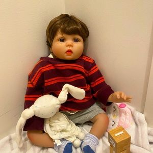 a slightly used reborn doll boy